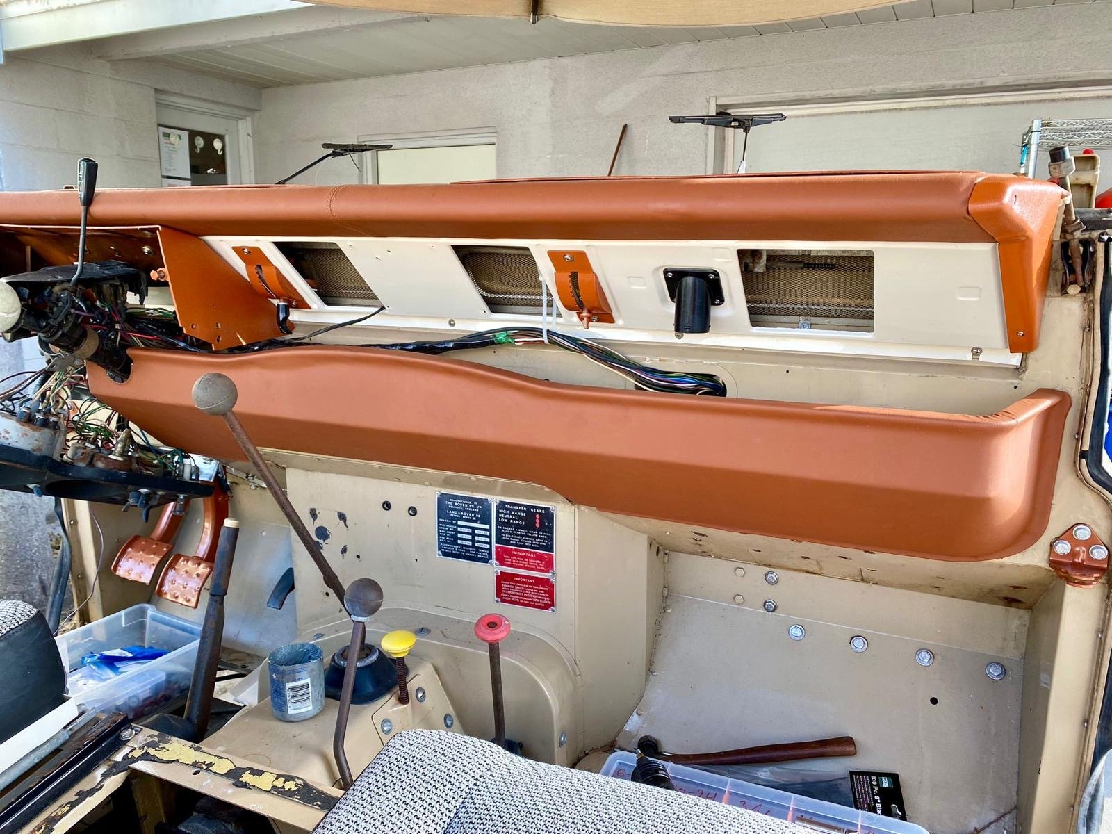 Tan upholstered dashboard installed